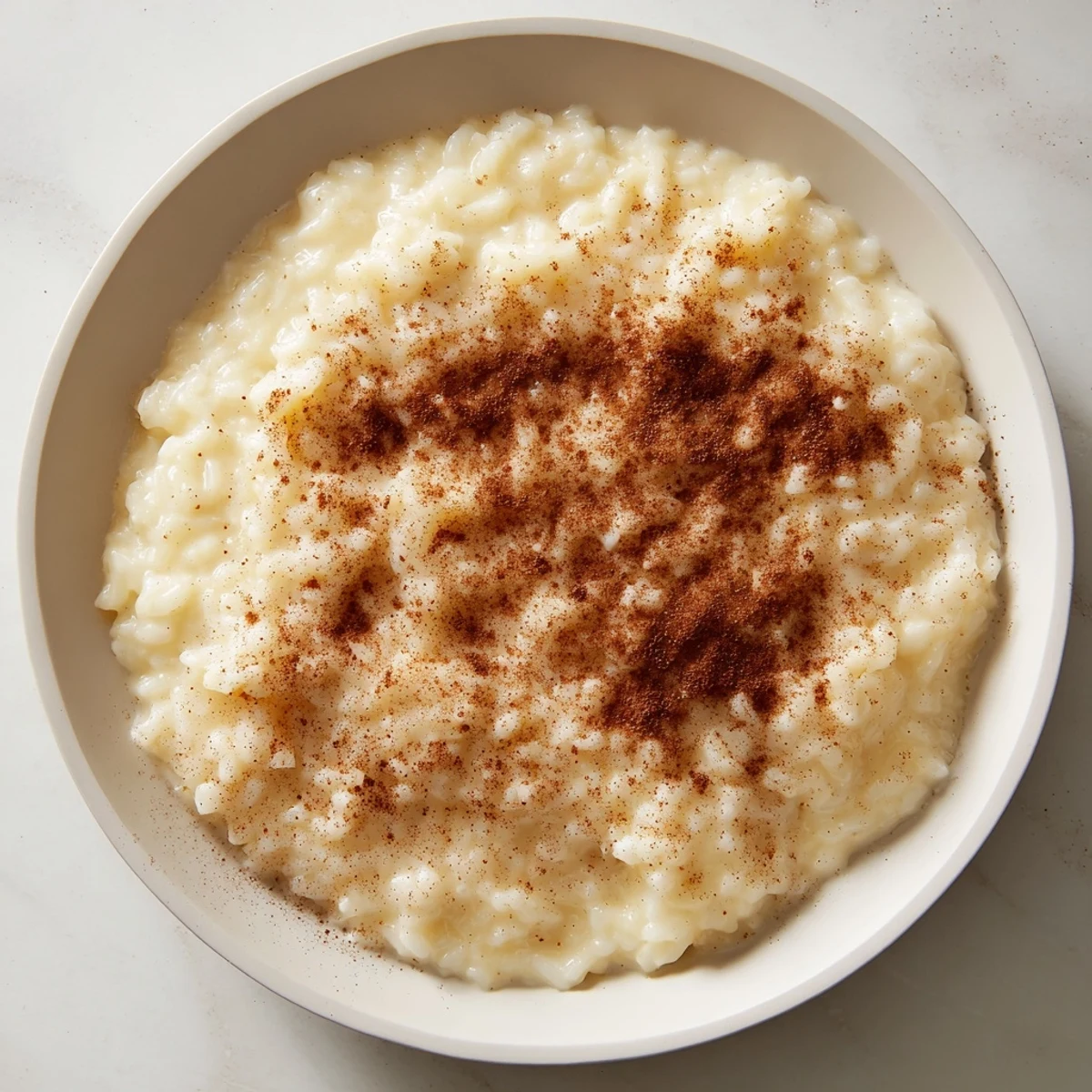 Simple and delicious: velvety texture of Rice Pudding with Leftover Rice, a comforting dessert.