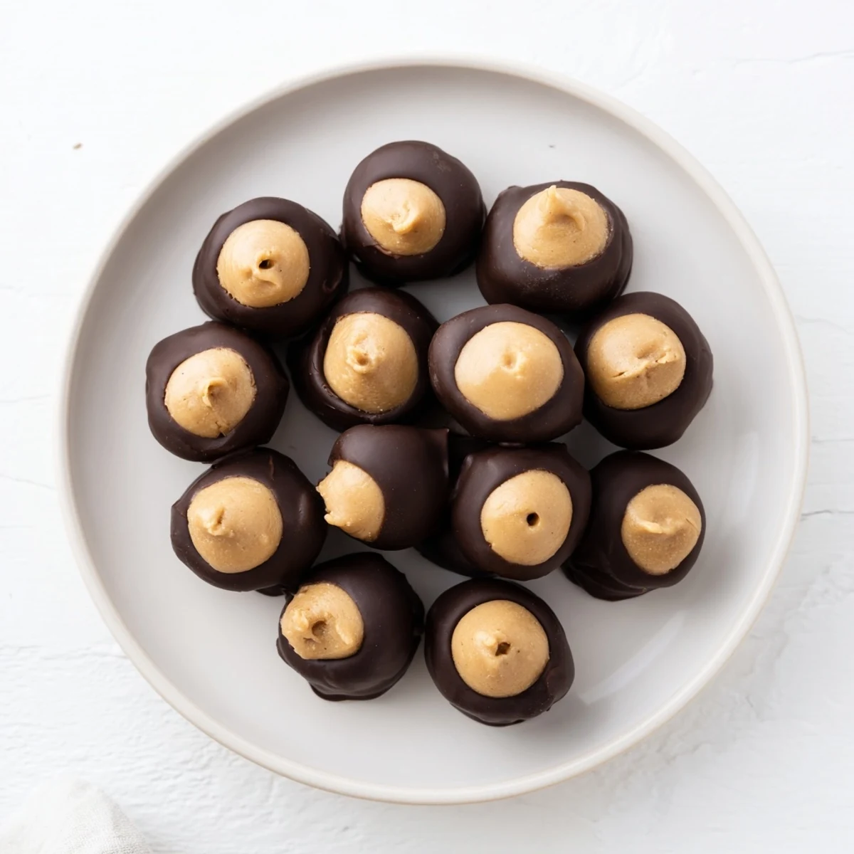 Picture these festive buckeyes: a batch of perfectly dipped peanut butter and chocolate bliss.
