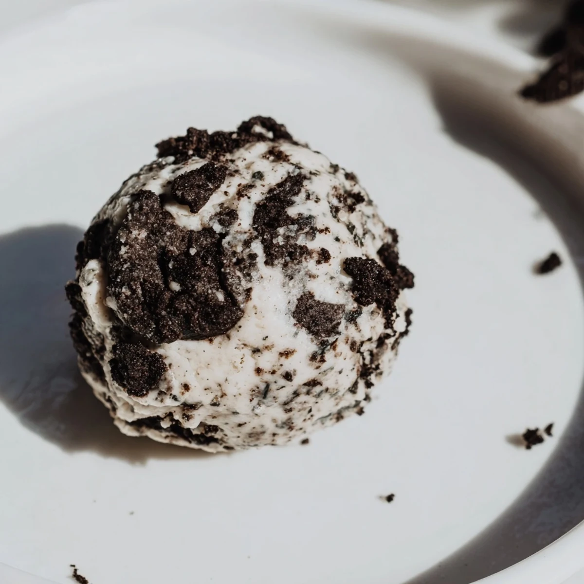 Creamy, no-bake Cream Cheese Oreo Protein Balls ready to eat, a perfect dessert or post-workout snack.