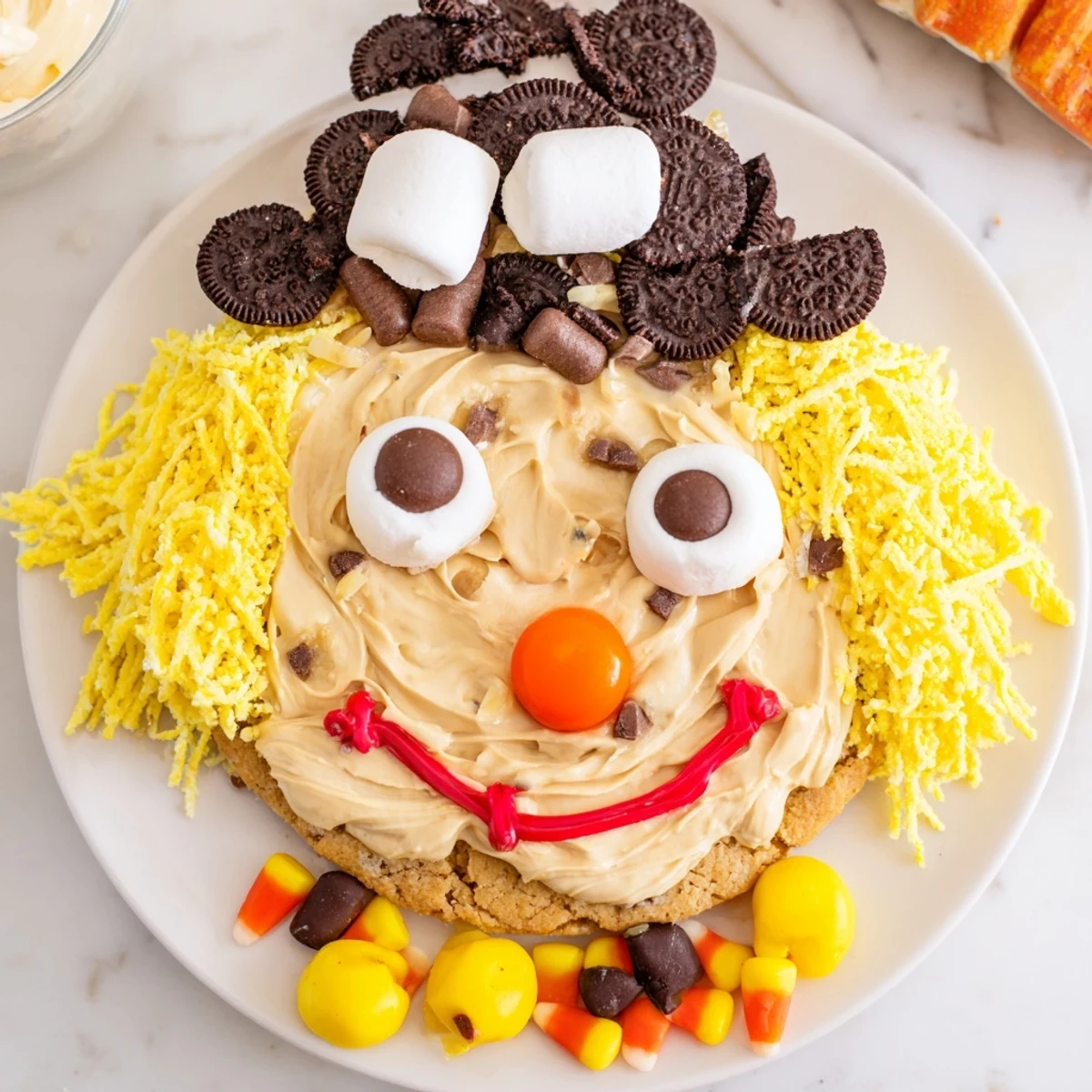 This easy-to-make Scarecrow Candy Platter is bursting with colorful, sweet, and festive candies.