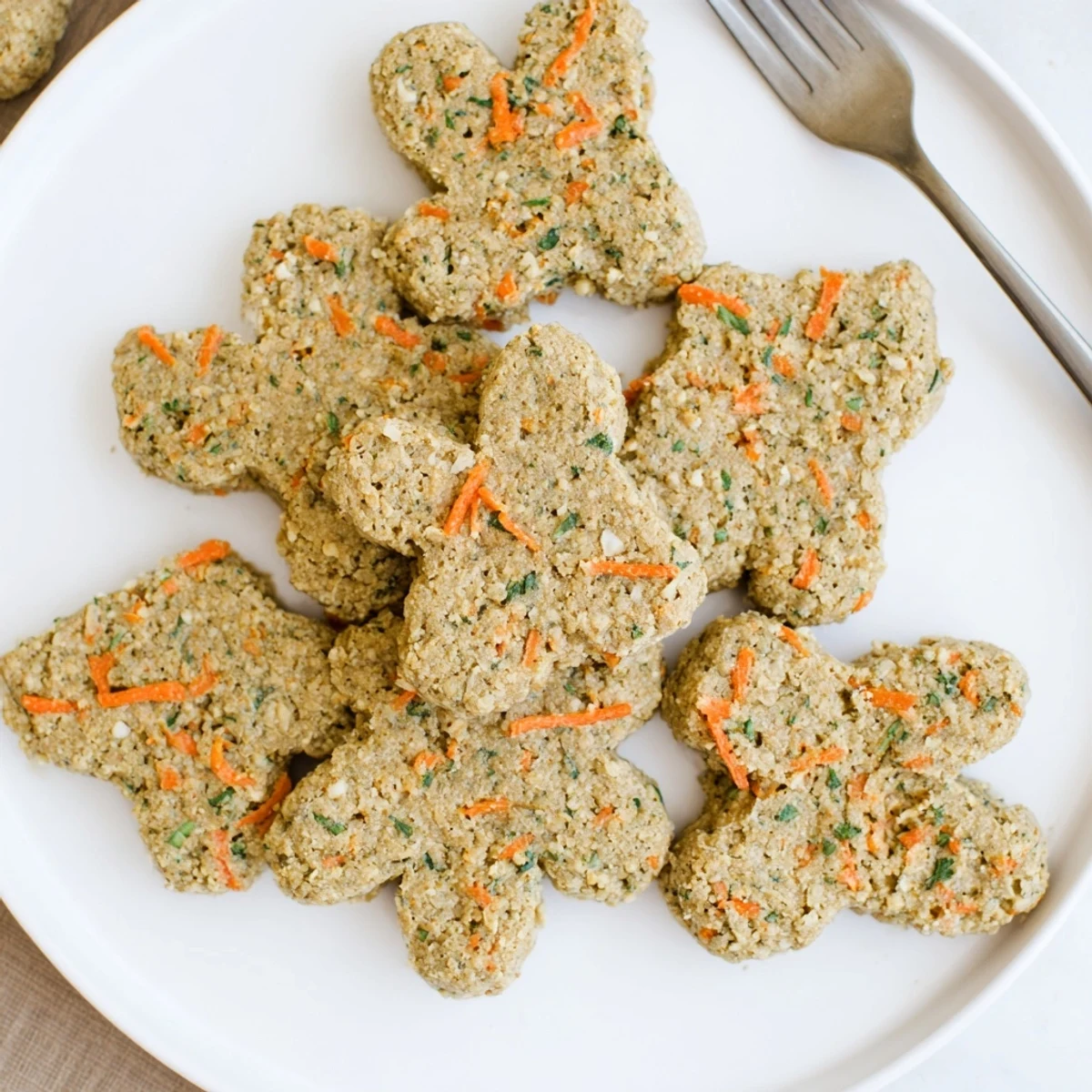 Homemade Friendly Dog Paw Treats, golden, baked to perfection, perfect wholesome rewards for furry friends.