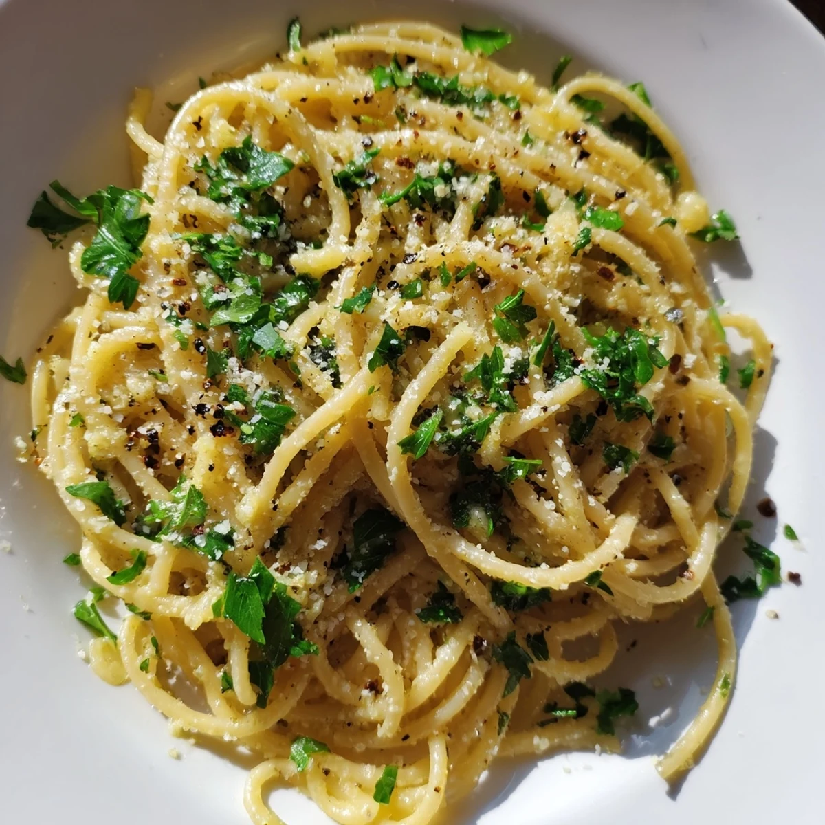 Creamy Garlic Butter Noodles, with optional Parmesan and lemon zest, a simple American comfort.