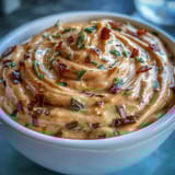 Silky homemade chipotle lime mayo infused with tangy citrus and spicy adobo sauce, ideal for grilled veggies.