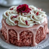 This pink velvet cake showcases a luscious rosé flavor with a decadent cream cheese frosting.