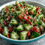 Vibrant, fresh pickle de gallo salsa served alongside crunchy tortilla chips.