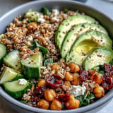 Hearty Ancient Grains Bowl, featuring plump chickpeas and fresh veggies, ready to enjoy.