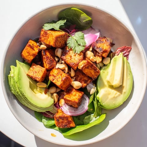 Warm, roasted spiced sweet potatoes in this lively, refreshing Spiced Peanut Sweet Potato & Radicchio Salad Bowl.
