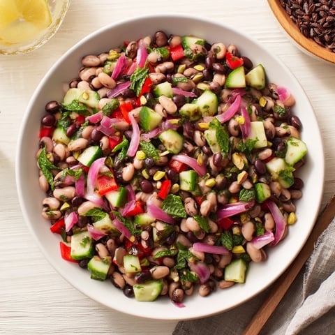 Vibrant, colorful Dense Bean Salad with Dubai Chocolate Notes, ready to be enjoyed as a refreshing meal.