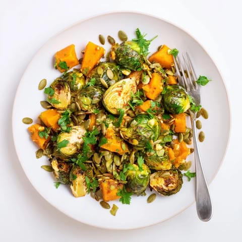 Tender, roasted vegetables and squash shine in this Roasted Brussels Sprouts & Butternut Squash recipe with a citrus glaze.
