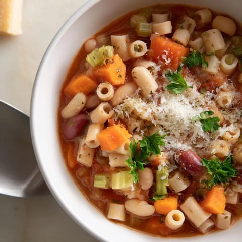Hearty Italian Pasta e Fagioli Soup, with visible pasta and creamy beans in a rich broth.