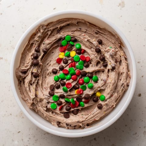 Festive Tree Brownie Dip, creamy and chocolatey, ready to serve with graham crackers and pretzels for dipping.