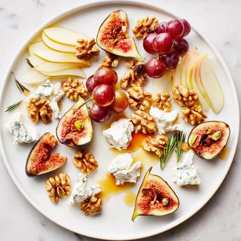 Artistic star-shaped presentation of the fig and walnut board, showcasing fresh fruit and creamy vegan cheese.