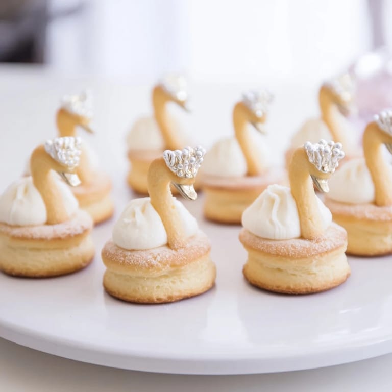 These elegant Swan Petit Fours are beautifully glazed, promising a delightful bite of French dessert tradition.