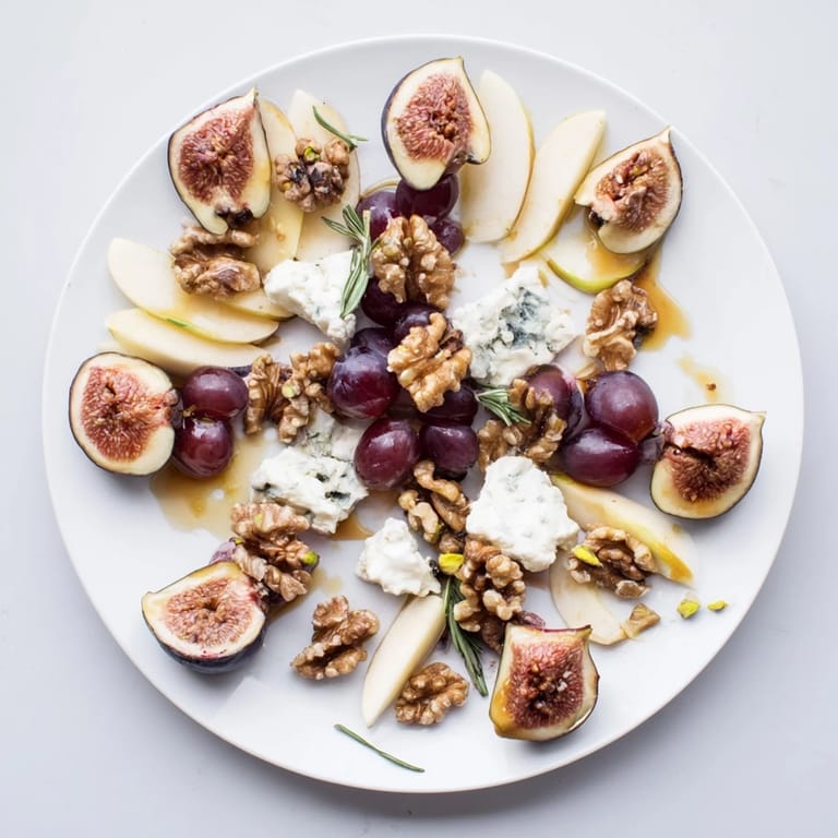 Sweet figs, toasted walnuts, and assorted crackers create a delicious, visually stunning fig and walnut star board.