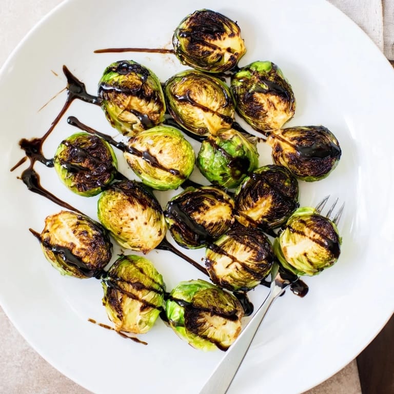 Golden roasted Brussels sprouts with balsamic glaze, a perfect savory-sweet side dish.