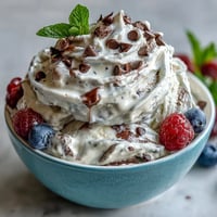 Creamy TikTok Cottage Cheese Ice Cream, a vibrant frozen dessert, ready to scoop.